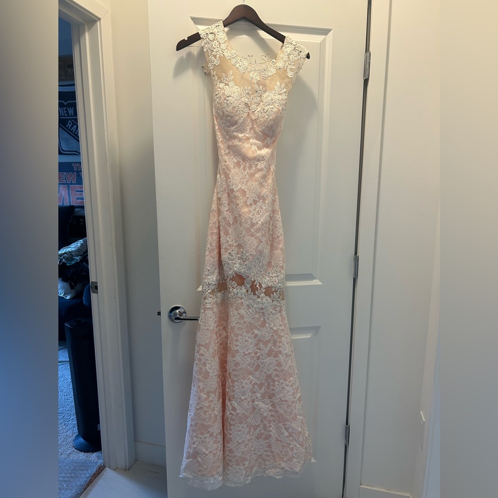 Ivy and peach lace evening gown size 4. Brand new, tags attached.